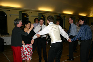 Jo teaching a group of dancers how to do the Dashing White Sergeant
